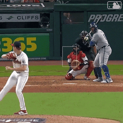 A Baseball Game Is Being Played In Front Of A Sign That Says Cliffs GIF