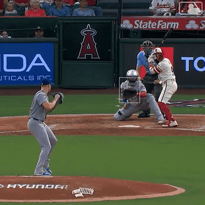 A Baseball Game Is Being Played In Front Of A Sign That Says State Farm GIF