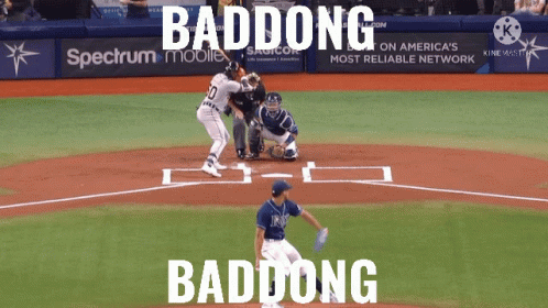 A Baseball Game Is Being Played In Front Of A Spectrum Mobile Sign GIF