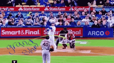 A Baseball Game Is Being Played In Front Of A State Farm Ad GIF