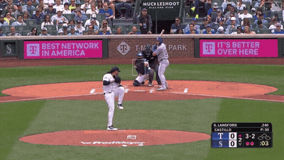 A Baseball Game Is Being Played In Front Of A T Mobile Sign GIF
