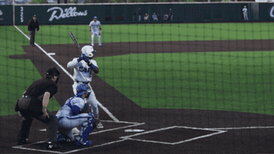 A Baseball Game Is Being Played In Front Of A Willows Sign GIF