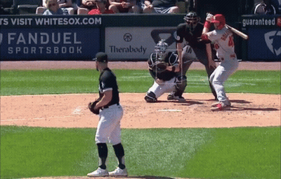 A Baseball Game Is Being Played In Front Of An Ad For Fanduel Sportsbook GIF