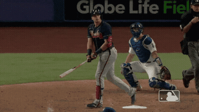 A Baseball Game Is Being Played In Front Of An Ad For Globe Life GIF