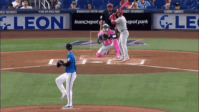 A Baseball Game Is Being Played In Front Of An Ad For Loan Depot Park GIF