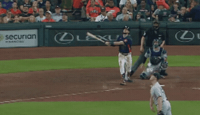 A Baseball Game Is Being Played In Front Of An Advertisement For Lexus GIF
