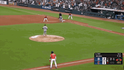 A Baseball Game Is Being Played In Front Of An Advertisement For Progressive GIF