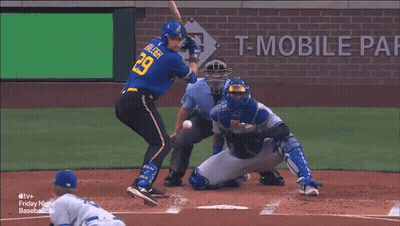 A Baseball Game Is Being Played In Front Of An Advertisement For T Mobile GIF