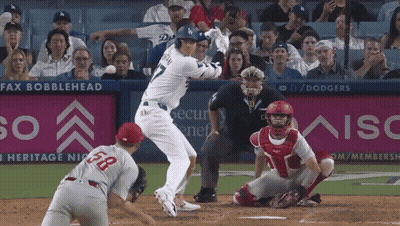 A Baseball Game Is Being Played In Front Of An Aisc Ad GIF