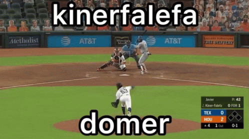 A Baseball Game Is Being Played In Front Of An At & T Ad GIF