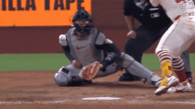 A Baseball Game Is Being Played In Front Of An Illa Tape Sign GIF