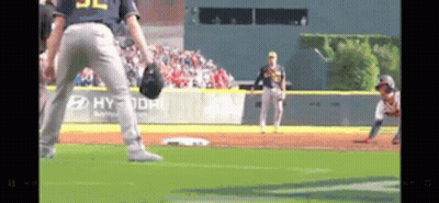 A Baseball Game Is Being Played On A Field With A Hyundai Ad On The Wall . GIF