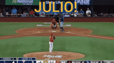 A Baseball Game Is Being Played With A National Car Rental Banner In The Background GIF