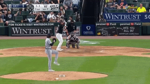 A Baseball Game Is Being Played With A Wintrust Ad In The Outfield GIF