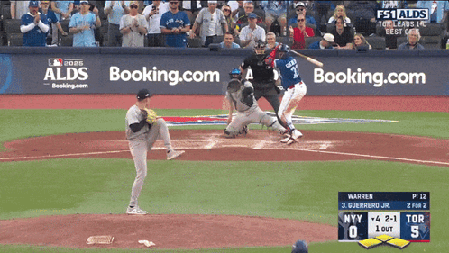 A Baseball Game Is Being Played With Advertisements For Booking.com GIF