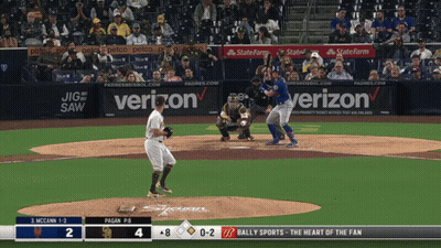 A Baseball Game Is Being Played With Advertisements For Verizon And State Farm GIF