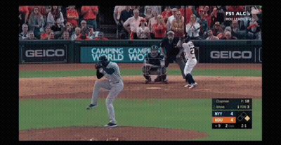A Baseball Game Is Being Played With An Ad For Geico GIF