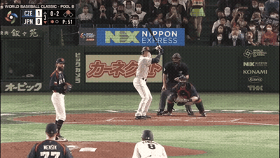 A Baseball Game Is Being Played With An Ad For Nex Express GIF