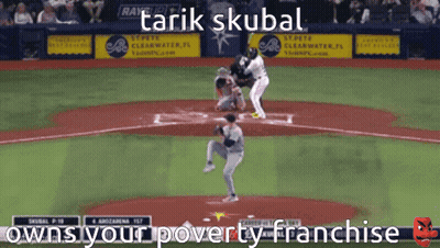 A Baseball Game Is Being Played With The Words " Owns Your Poverty Franchise " On The Screen GIF