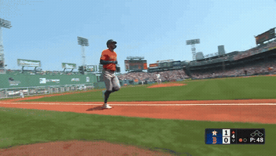a baseball game is underway and the scoreboard shows that the boston red sox are leading 1 to 0
