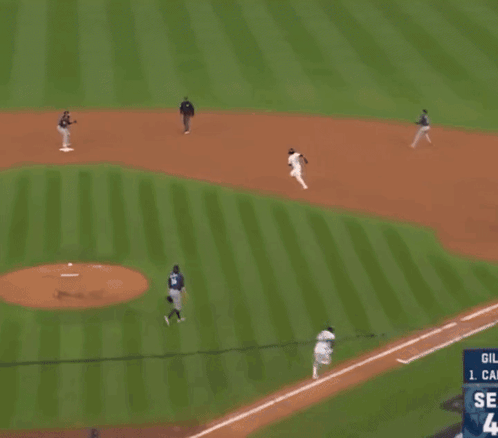 A Baseball Game Is Underway And The Scoreboard Shows The Score As 4 To 1 GIF