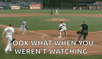A Baseball Game With The Words Look What When You Weren T Watching GIF