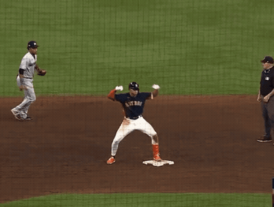 A Baseball Player For The Astros Is Standing On The Base GIF