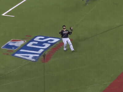 A Baseball Player For The Indians Is Kneeling Down GIF