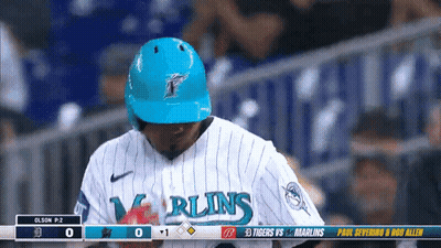 A Baseball Player For The Miami Marlins Looks Down At The Scoreboard GIF