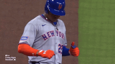 A Baseball Player For The New York Mets Is Giving A Thumbs Up . GIF