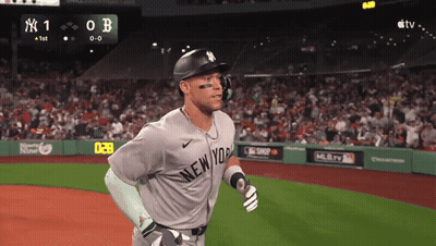 A Baseball Player For The New York Yankees Runs On The Field During A Game GIF