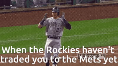 A Baseball Player From The Colorado Rockies Holds His Head In His Hands GIF