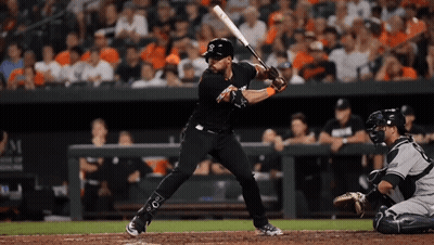 A Baseball Player Getting Ready To Hit A Ball With The Letter S On His Shirt GIF