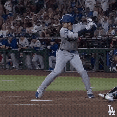 A Baseball Player Getting Ready To Swing At A Pitch With The La Logo In The Corner GIF