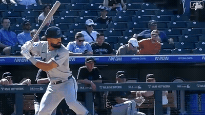 A Baseball Player Getting Ready To Swing His Bat In Front Of A Mlb Network Banner GIF