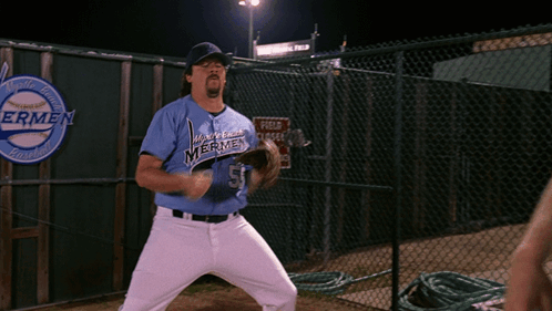 A Baseball Player In A Blue Jersey With The Number 5 On It GIF
