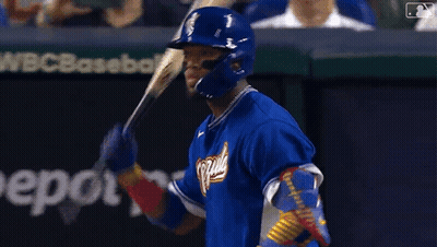 A Baseball Player In A Blue Uniform With The Word Virginia On The Front GIF