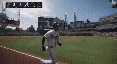 A Baseball Player In A Braves Uniform Is Running On A Baseball Field GIF