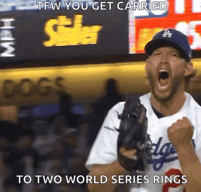 A Baseball Player In A Dodgers Uniform Is Celebrating A Win GIF