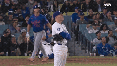 A Baseball Player In A Dodgers Uniform Looks Up At The Sky GIF