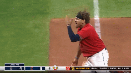 A Baseball Player In A Red Jersey With The Number 8 On The Bottom Left GIF