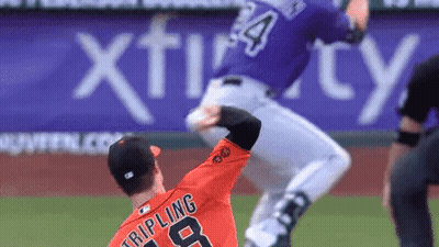 A Baseball Player In An Orange Jersey With The Number 8 On The Back GIF