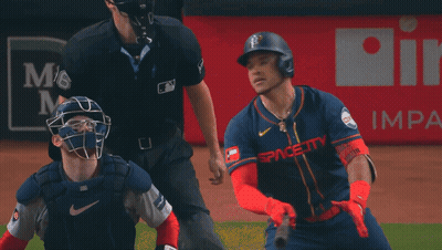 A Baseball Player In Front Of A Reliant Ad GIF