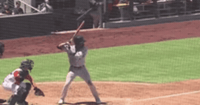 A Baseball Player Is Getting Ready To Hit The Ball GIF