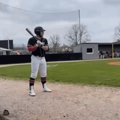 A Baseball Player Is Getting Ready To Swing At The Ball GIF