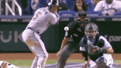 A Baseball Player Is Getting Ready To Throw A Ball While A Catcher Watches . GIF