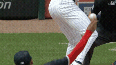 A Baseball Player Is Getting Ready To Throw The Ball While Another Player Watches GIF