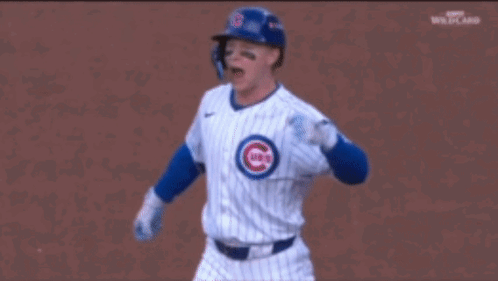 A Baseball Player Is Giving A Thumbs Up While Wearing A Helmet . GIF
