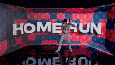 A Baseball Player Is Holding A Bat In Front Of A Wall That Says Home Run GIF