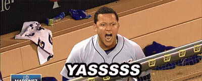 A Baseball Player Is Screaming In The Dugout And The Word Yassss Is On The Screen Behind Him GIF